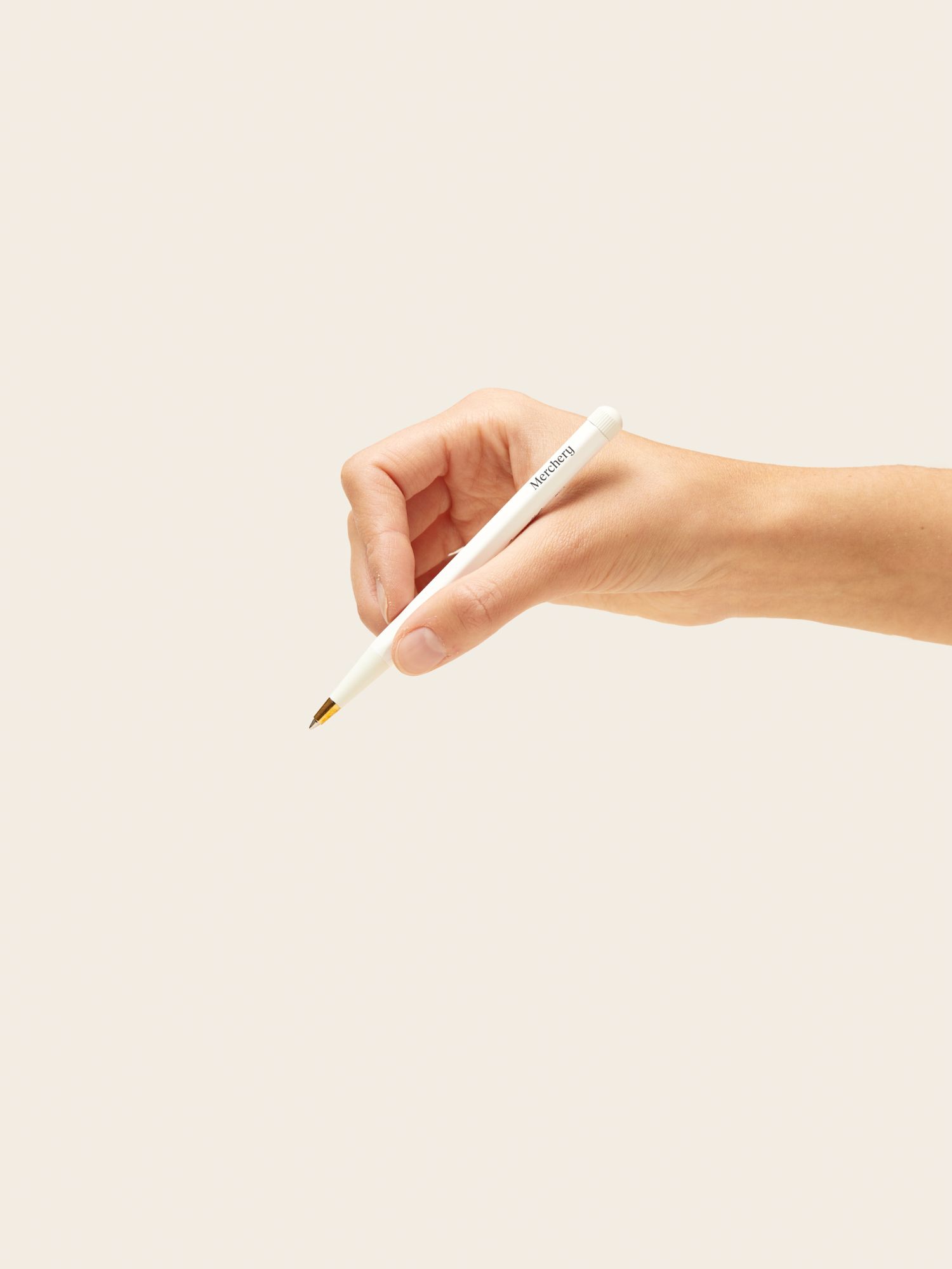 MERCHERY_MERCHERY_Twist action pen_white_holding_2 1.jpg